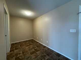 Property Photo:  7130 80 Avenue NE 404  AB T3J 0N5 