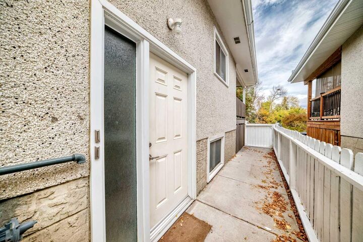 Property Photo:  7409 37 Avenue NW  AB T3B 1W8 