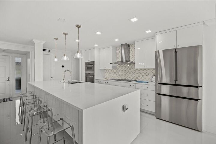 Property Photo:  5390 Woodland Lakes Drive 105  FL 33418 