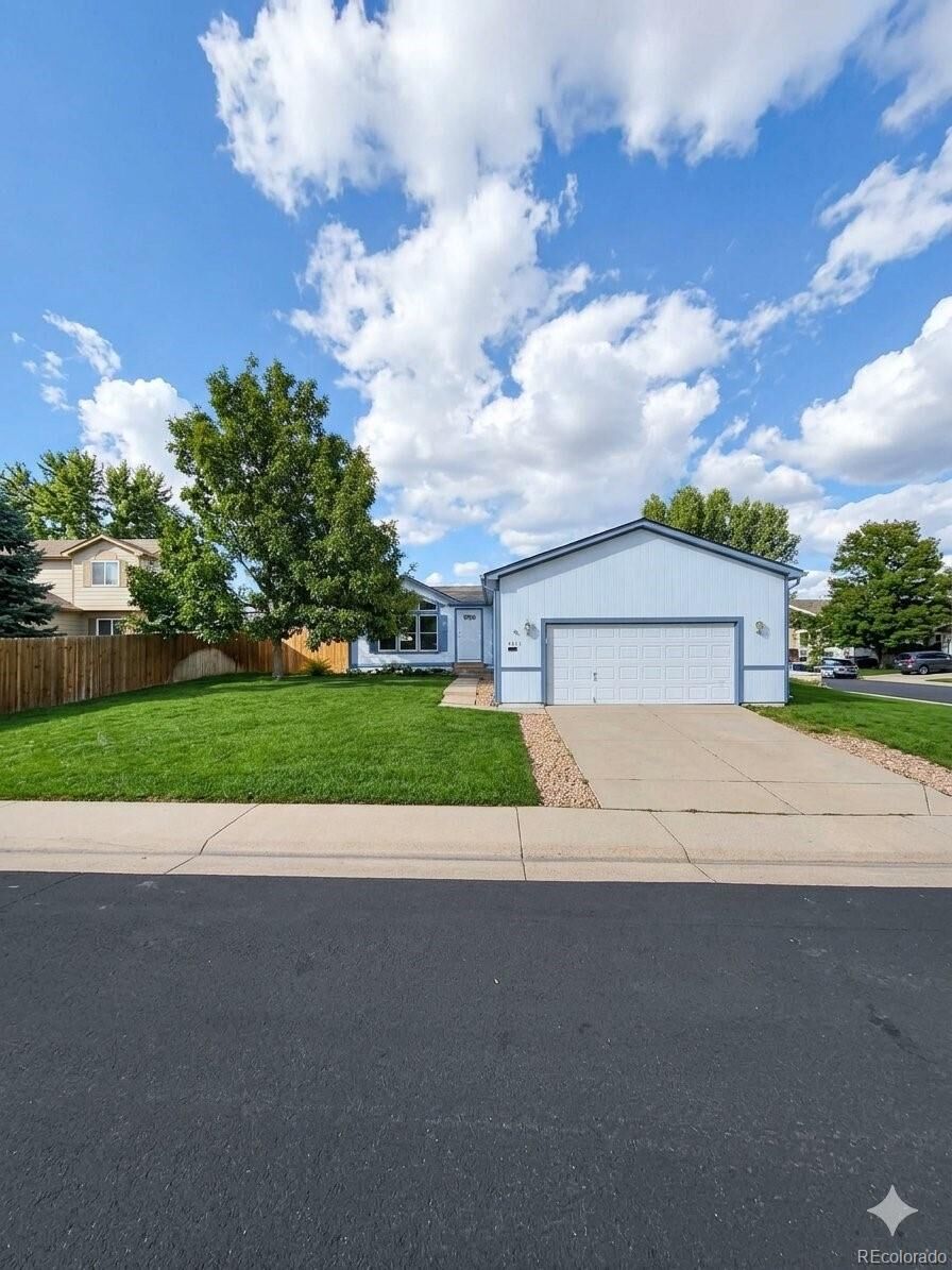 Property Photo: 5873 S Quemoy Circle CO 80015