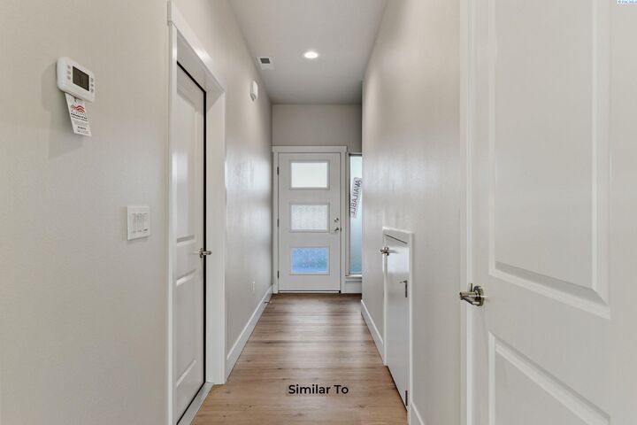 Property Photo:  763 Honeylicious St  WA 99352 