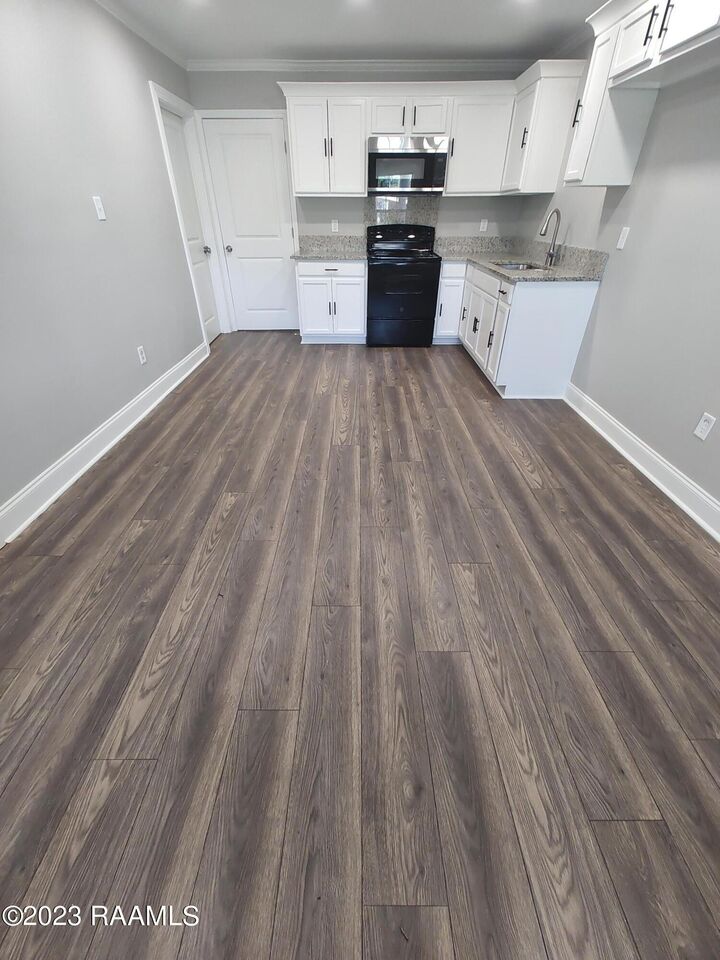 Property Photo:  400 S Granger Street A  LA 70533 