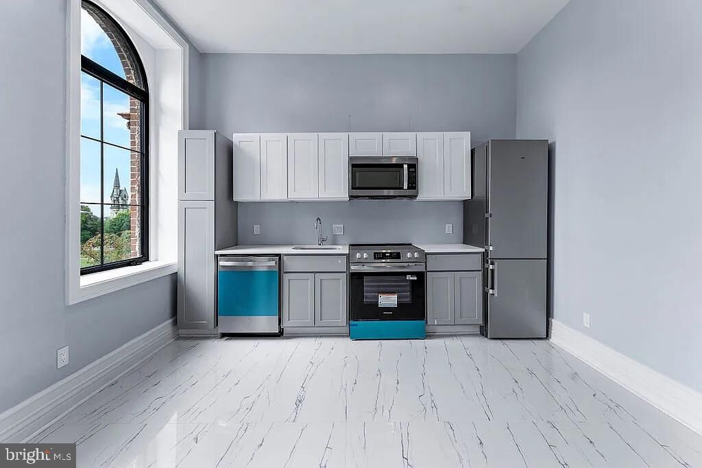 Property Photo:  1100 W Lafayette Avenue 4  MD 21217 