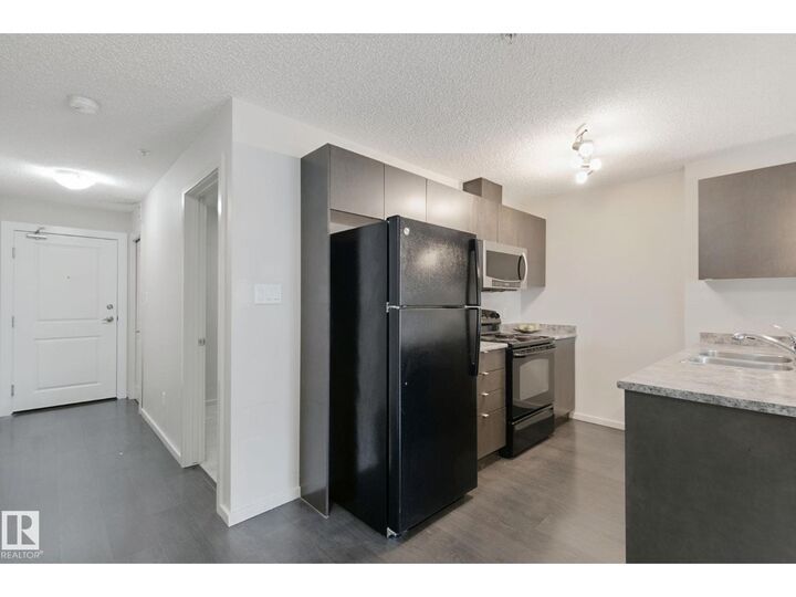 Property Photo:  #330 344 Windermere Rd NW  AB T2P 2P2 