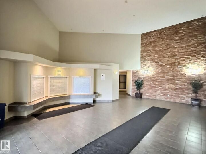 Property Photo:  #103 5350 199 St NW  AB T6M 0A4 