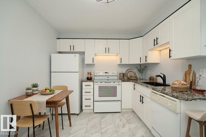 Property Photo:  1679 Lakewood Rd S NW  AB T6K 3B9 