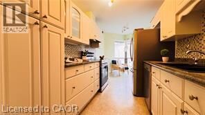 Property Photo:  300 Keats Way 207  ON N2L 6E6 