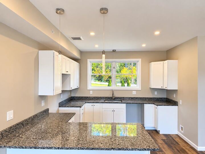 Property Photo:  12 Cobblestone Court  NH 03246 