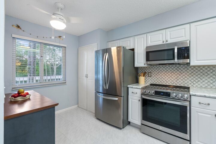 Property Photo: 6096 Huntwick Terrace 206 FL 33484