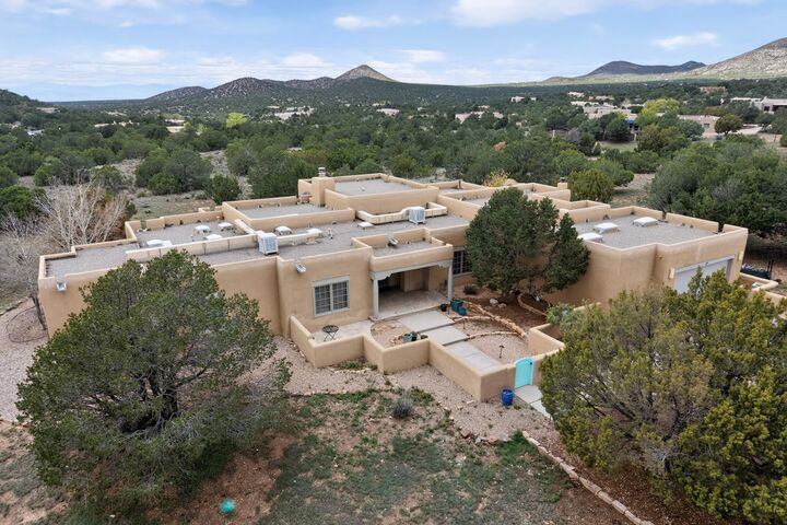 Property Photo:  24 Calle Electra  NM 87508 
