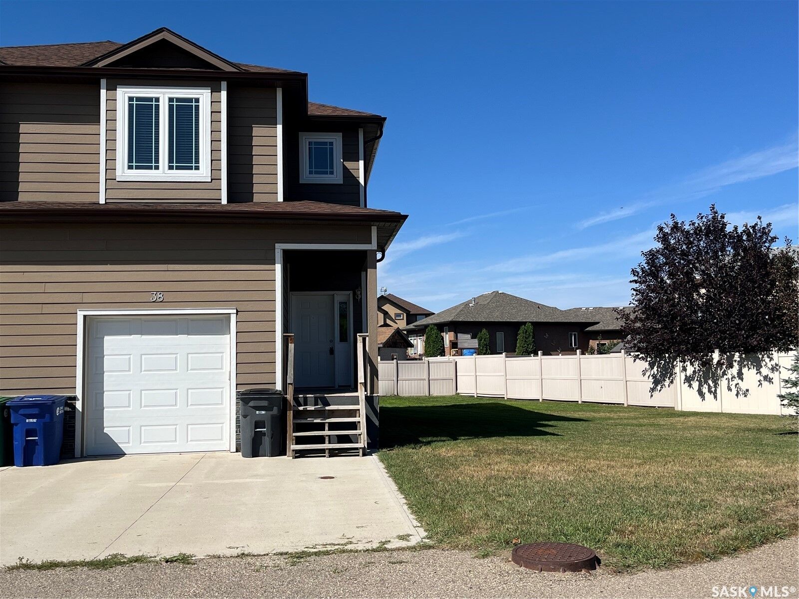 Property Photo:  38 McKenzie Lane  SK S4L 0B2 