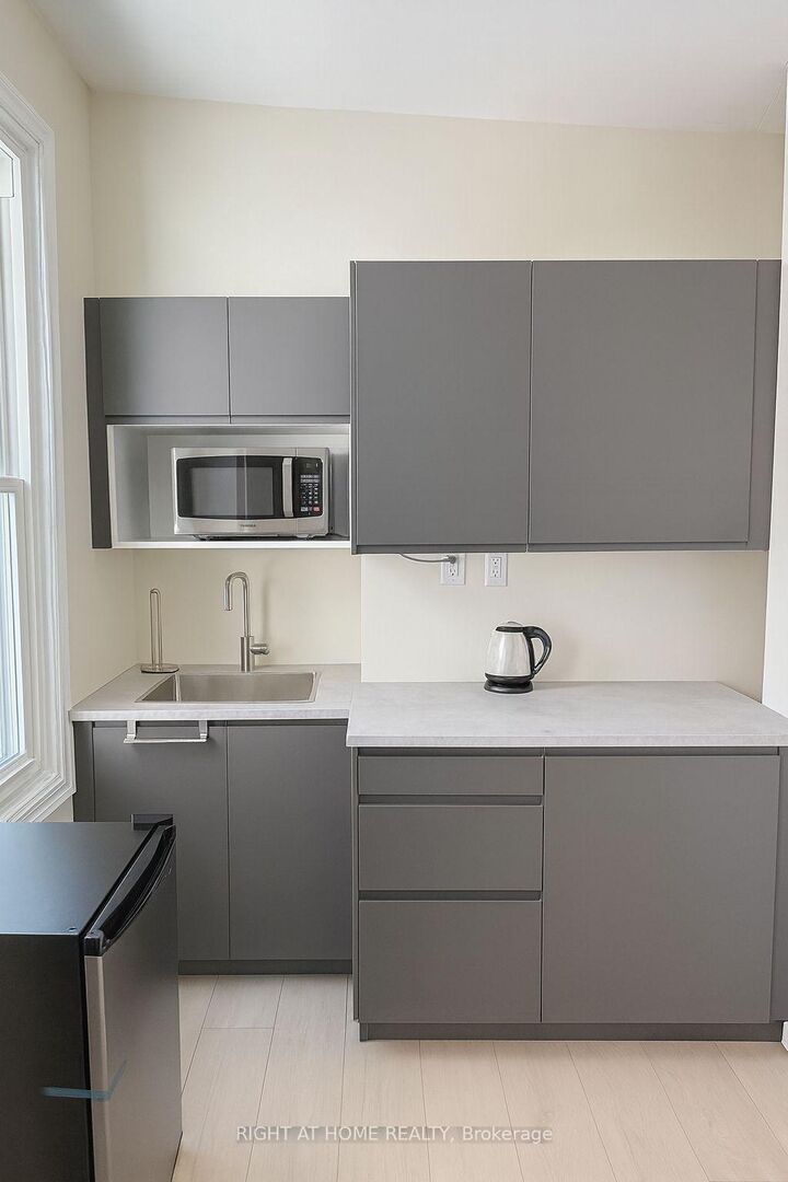 Property Photo: 198-200 Queen Street W 205 ON M5V 1Z2
