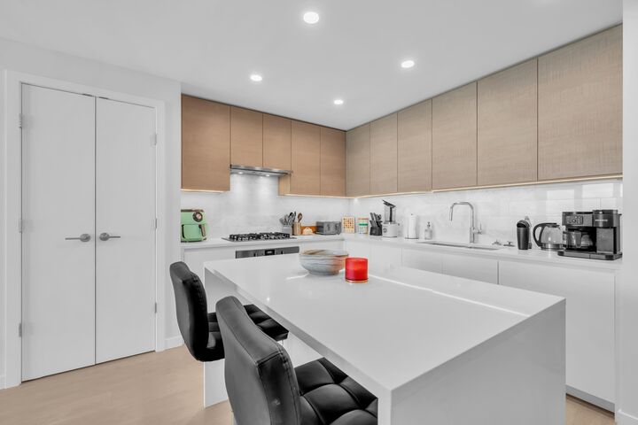 Property Photo:  4168 Lougheed Highway 2506  BC V5C 0N9 