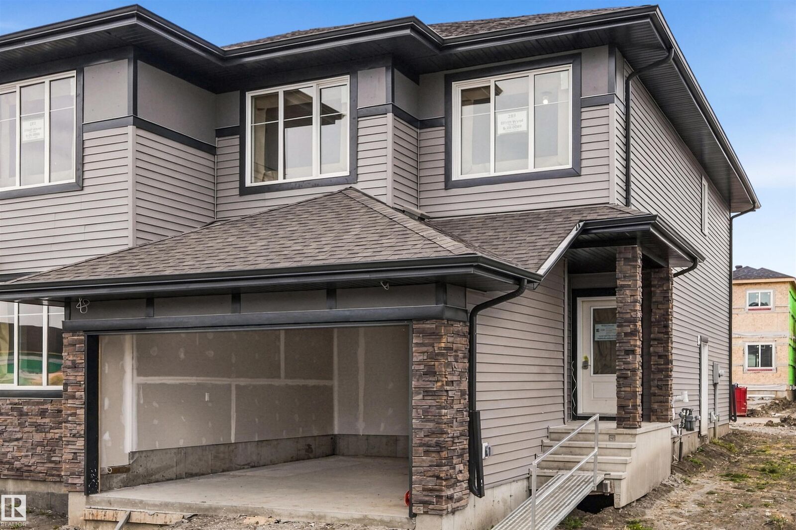 Property Photo:  289 Elliott Wynd  AB T8L 3X6 
