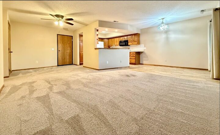 Property Photo:  403 SE Delaware Avenue 306  IA 50021 
