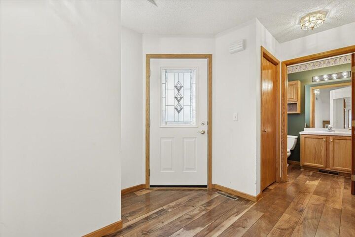 Property Photo: 7987 Forest Boulevard Unit F MN 55125