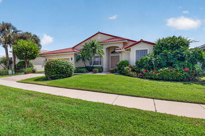 Property Photo:  6802 Treves Way  FL 33437 