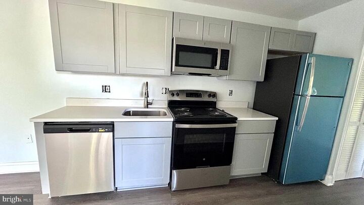Property Photo:  26040 Woodfield Road 14  MD 20872 