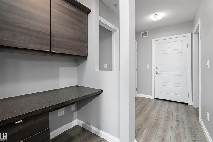Property Photo: 2590 Anderson Way SW 311 AB T6W 0R2
