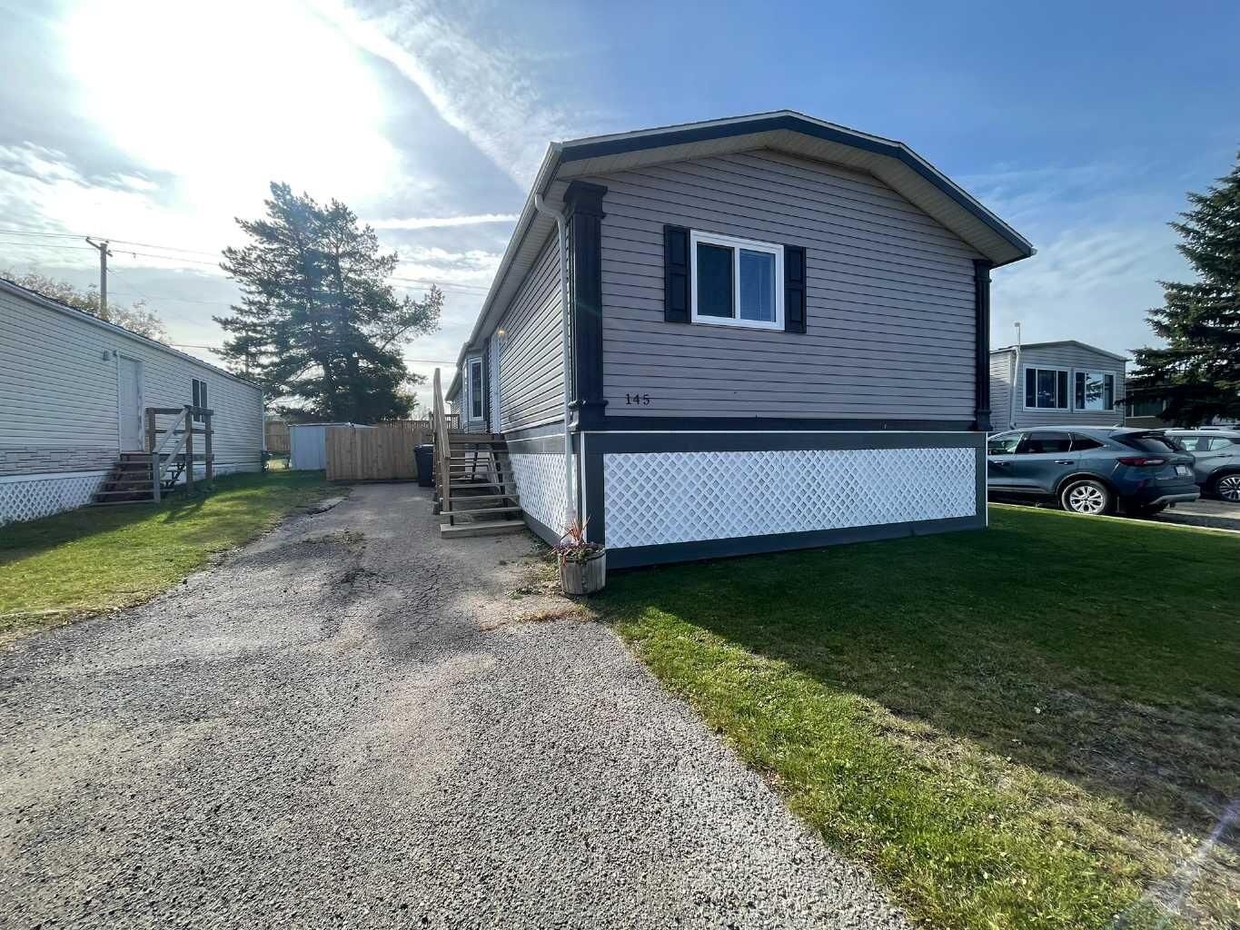 Property Photo:  5308 57 Street 145  AB T9V 2A3 