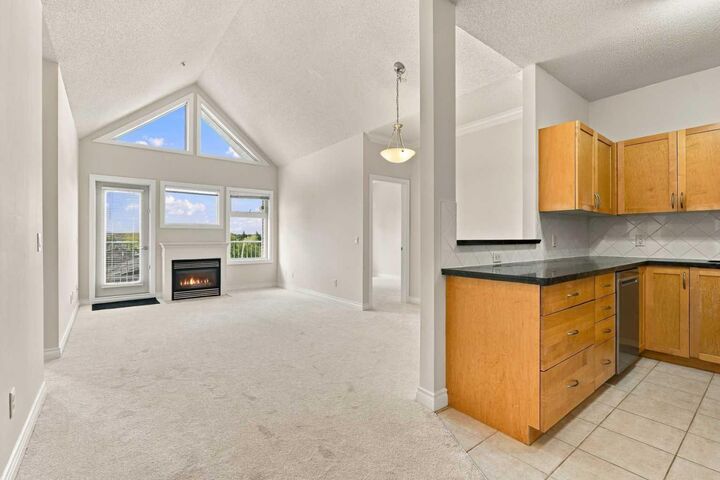 Property Photo:  11170 30 Street SW 302  AB T2W 6J2 