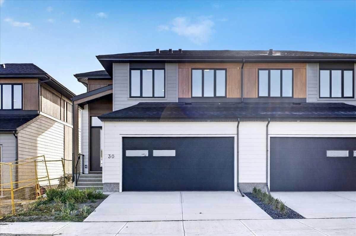Property Photo: 30 Harbour Way AB T3Z 0K1