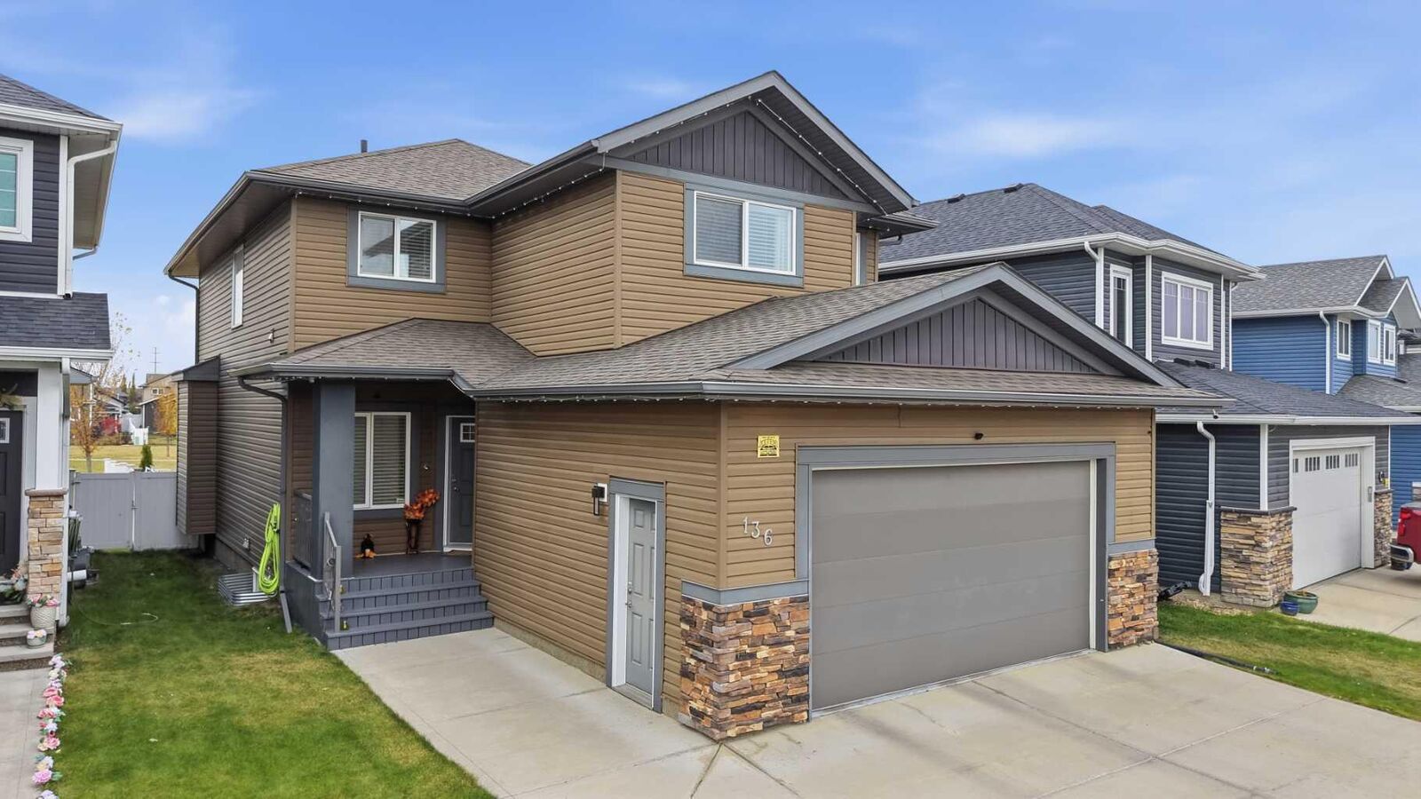 Property Photo: 136 Van Slyke Way AB T4R 0N5