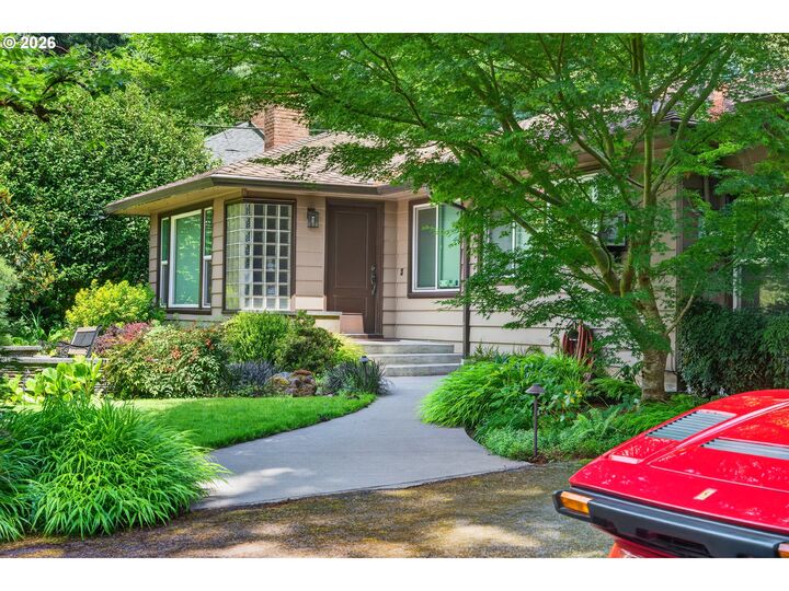 Property Photo:  10408 SW 53rd Ave  OR 97219 