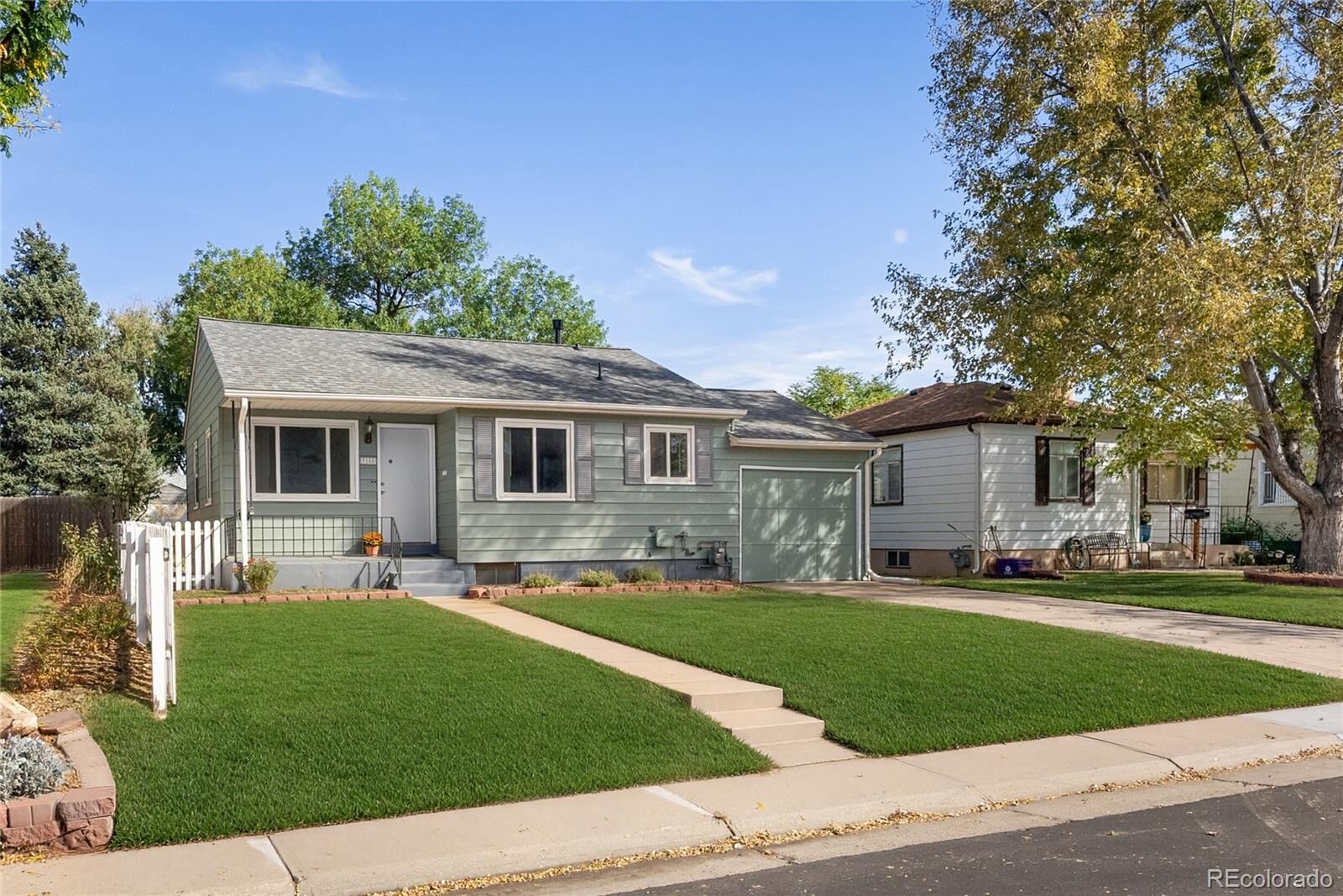 Property Photo:  3158 S Fox Street  CO 80110 