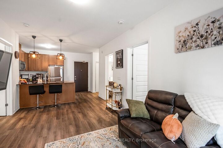 Property Photo: 102 Grovewood Common Circle 110 ON L6H 0X2