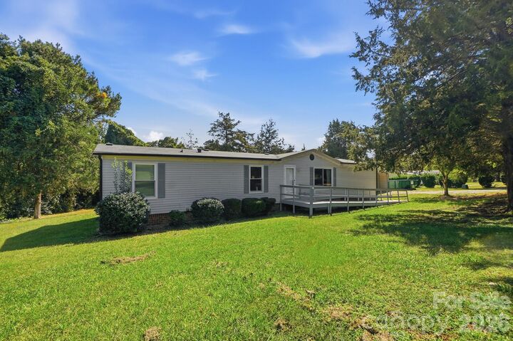 Property Photo:  6017 Frazier Drive  NC 28036 