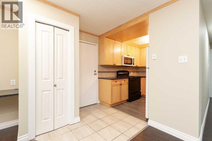 Property Photo:  295 Columbia Boulevard West  AB T1K 4B8 
