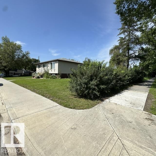 Property Photo:  11404 127 Avenue NW  AB T5E 0C6 