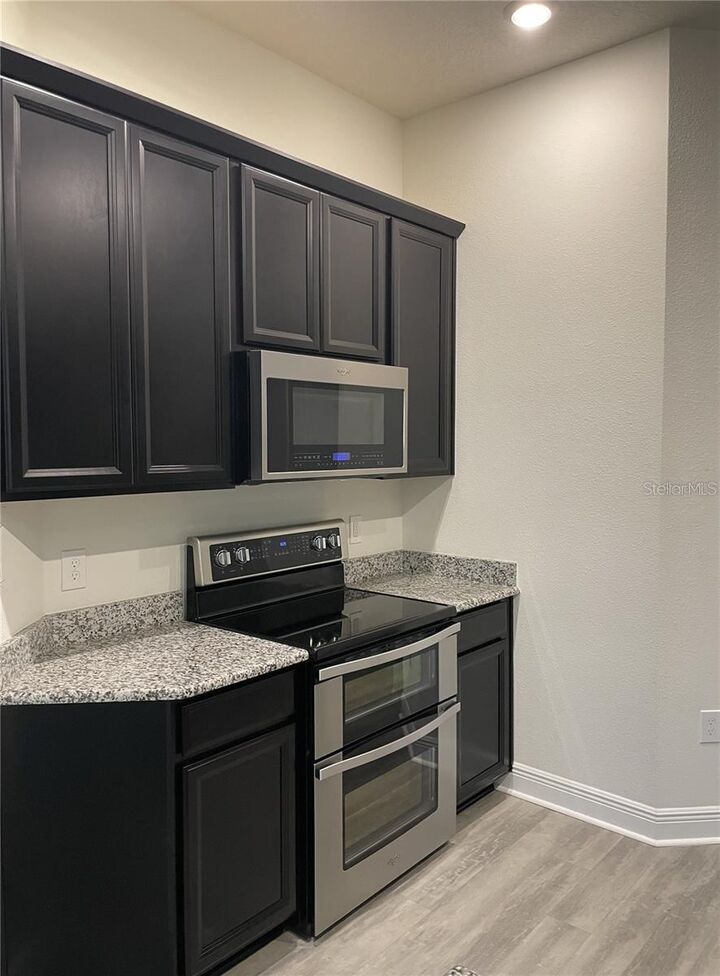 Property Photo: 9469 Meadow Hunt Way FL 34787
