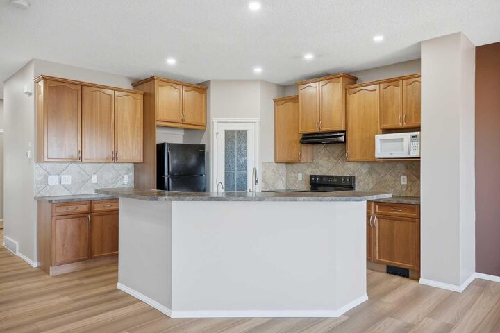 Property Photo: 249 Saddlecrest Way NE AB T3J 5N3