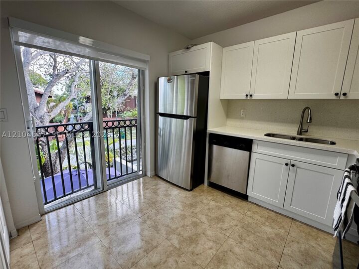 Property Photo:  6676 SW 115th Ct 404  FL 33173 