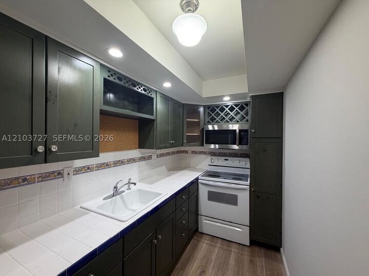 Property Photo:  16518 NE 26th Ave 405  FL 33160 