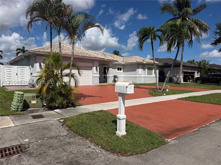 Property Photo: 9011 NW 162nd Ter 9011 FL 33018