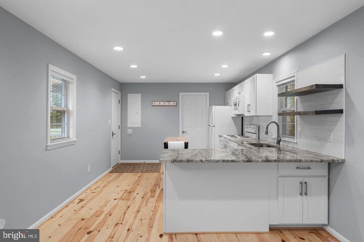 Property Photo: 44600 Tall Timbers Road Unit B MD 20690