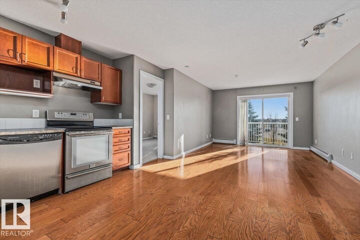 Property Photo:  240 Spruce Ridge Road 309  AB T7X 1J7 