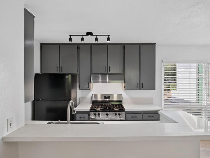 Property Photo:  15408 La Mirada Boulevard Cc101  CA 90638 