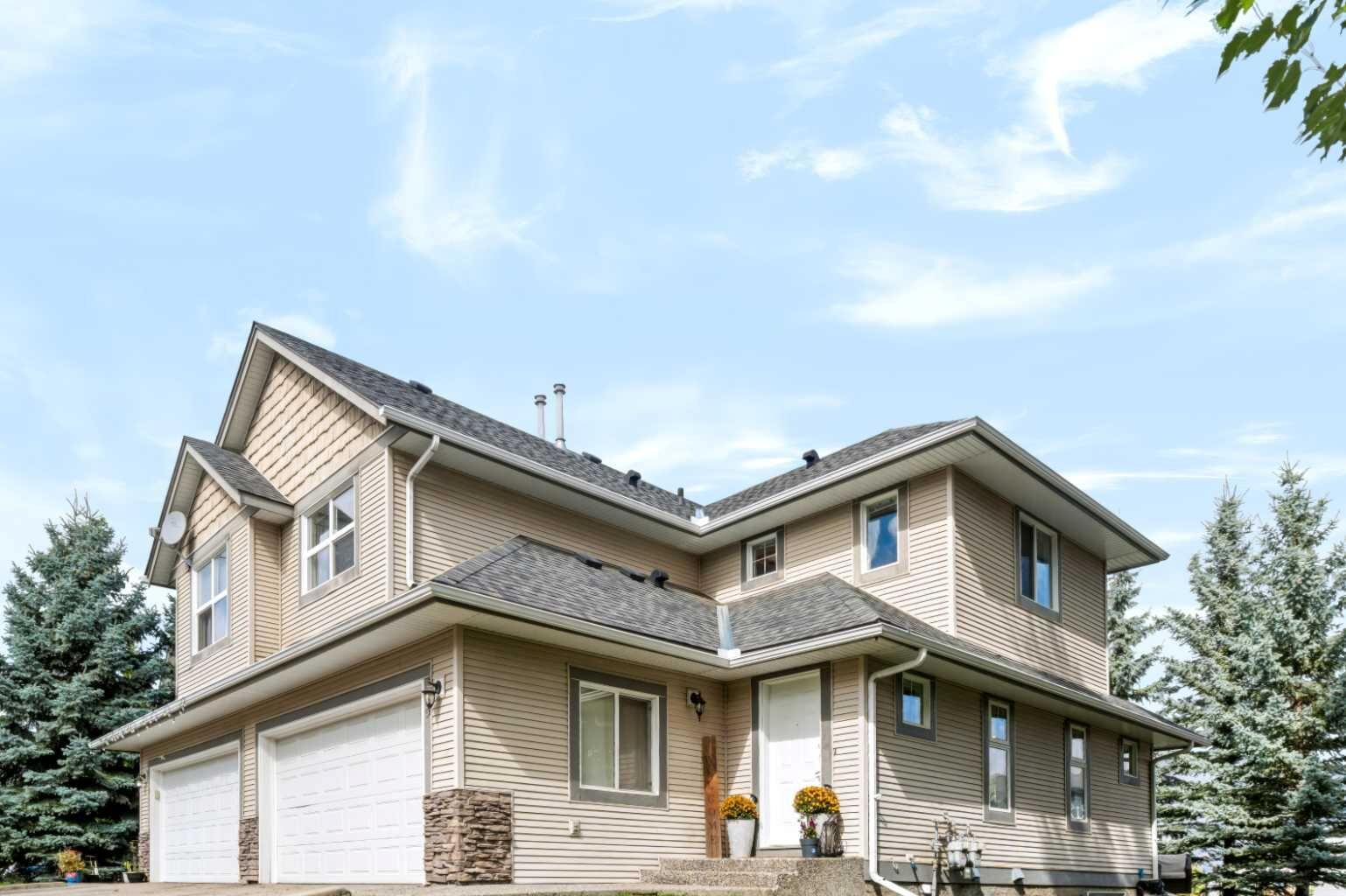 Property Photo:  75 Cedarwood Lane SW  AB T2W 6J3 
