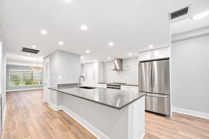 Property Photo: 730 Greensward Court 108-J FL 33445