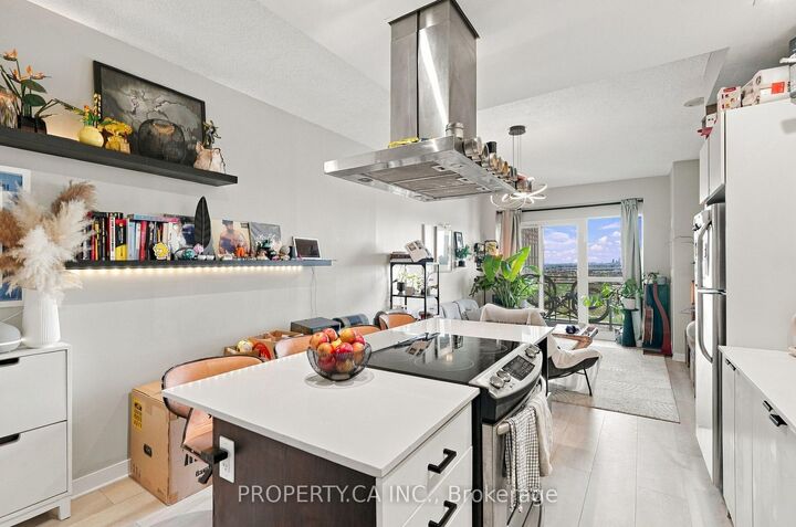 Property Photo:  165 Legion Road 2032  ON M8Y 0B3 