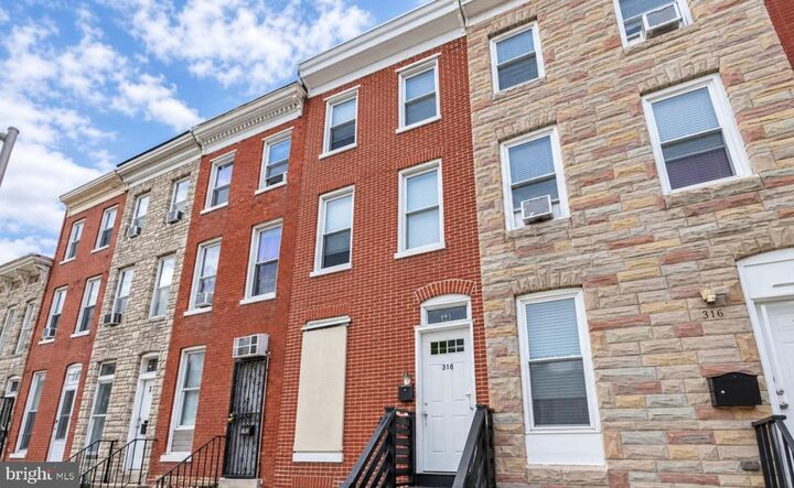 Property Photo:  318 S Mount Street  MD 21223 