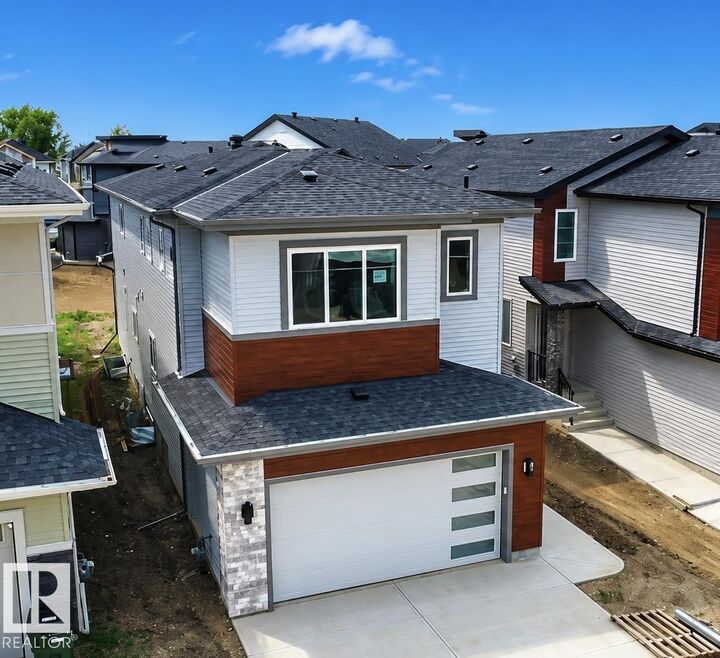 Property Photo:  8916 Mayday Wy SW  AB T6X 3E9 