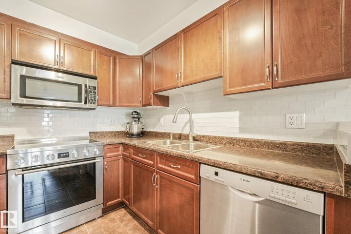 Photo de la propriété:  1589 Glastonbury Boulevard NW 209  AB T5T 2V1 