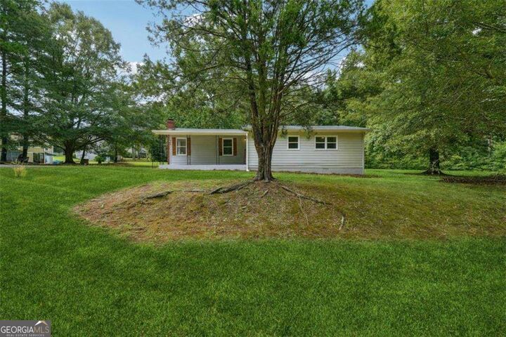 Property Photo:  309 Cowan Road SE  GA 30094 