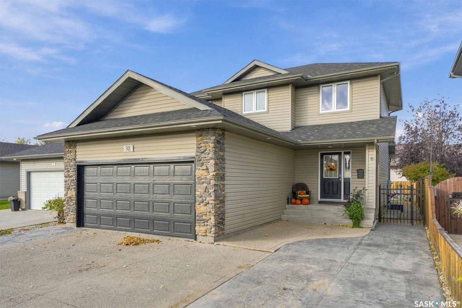 Property Photo:  311 Denham Court  SK S7R 1E5 