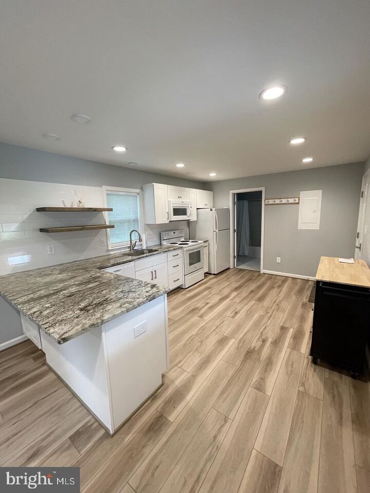Property Photo: 44600 Tall Timbers Road A MD 20690